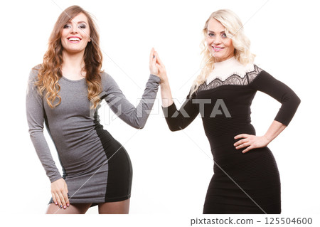 Adult mother and daughter portrait 125504600