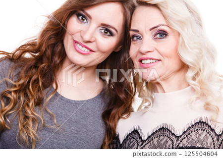 Portrait of adult daughter with mother Portrait of adult daughter with mother 125504604