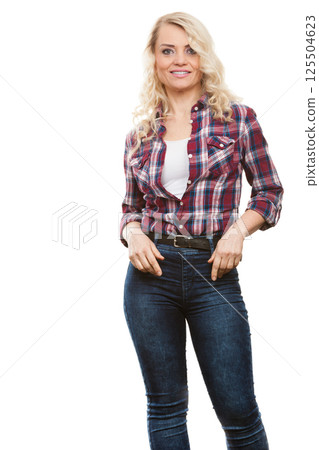 Mid aged woman casual style posing Mid aged woman casual style posing 125504623