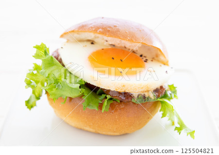 Delicious Teriyaki Egg Burger 125504821