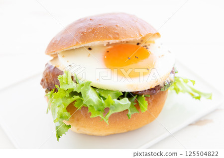 Delicious Teriyaki Egg Burger 125504822