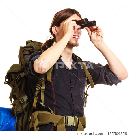 Man tourist backpacker looking through binoculars. Man tourist backpacker looking through binoculars. 125504858