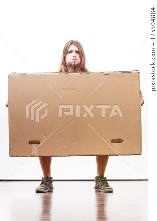 Delivery man holding a paper box. Delivery man holding a paper box. 125504884