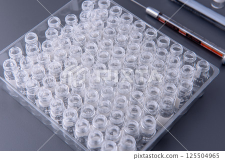 Close up view , empty glass vials in chemical laboratory Close up view , empty glass vials in chemical laboratory 125504965