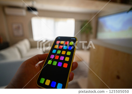 A man with a smartphone A man with a smartphone 125505050