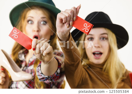 Two woman after sale shopping Two woman after sale shopping 125505384