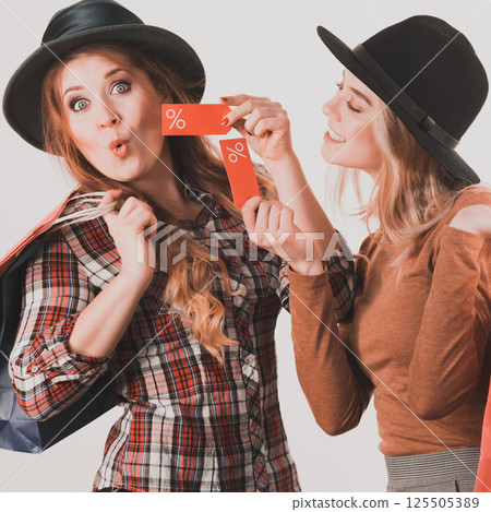 Two woman after sale shopping Two woman after sale shopping 125505389