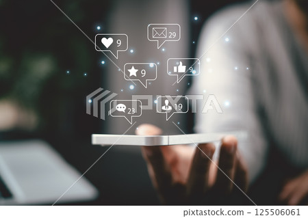 She used love icon to share her message on social media, showcasing her affection through heartfelt post in marketing strategy aimed to engage broader audience. comment phone, social media concept. 125506061