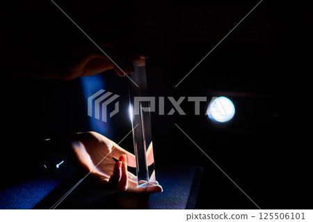 An engaging Light Refraction Experiment using a Prism and the interaction of hands 125506101