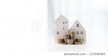Home loans and real estate business concept. Mortgage from the bank for a property investment is a crucial finance concept in the realm of home loans and real estate business. banner with copy space. 125506465