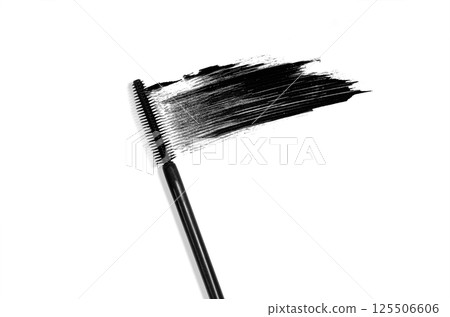 A sample of black mascara for eyelashes . White background 125506606
