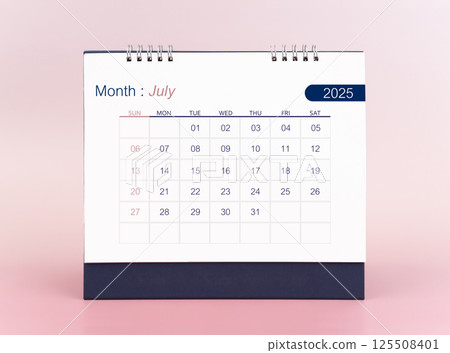 July 2025 blank desk calendar on pink background. July 2025 blank desk calendar on pink background. 125508401