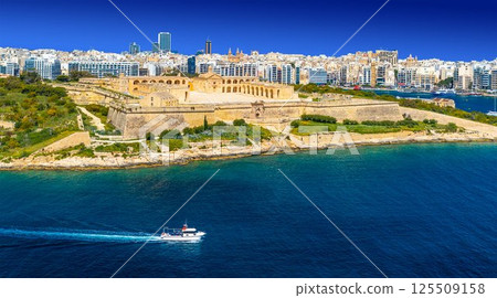 Picturesque panorama with ship passing Manoel Island fortress and Sliema in the background, Malta 125509158