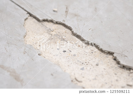 Image of P tiles cracked due to aging (stock photo) 125509211