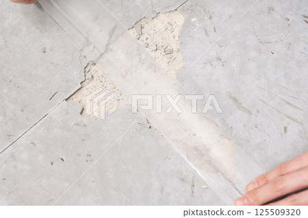 First aid for cracked P tiles (stock photo) First aid for cracked P tiles (stock photo) 125509320