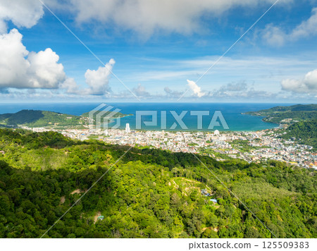 High angle view Patong bay at Phuket Thailand with mountains rainforest trees High angle view Patong bay at Phuket Thailand with mountains rainforest trees 125509383