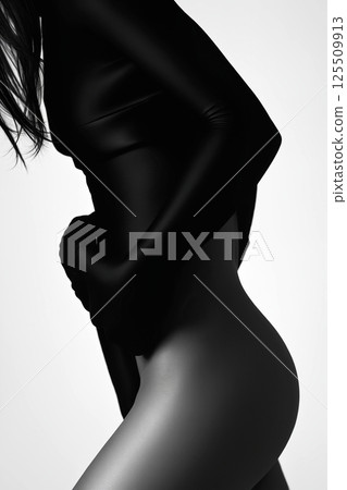 female silhouette over white background 125509913
