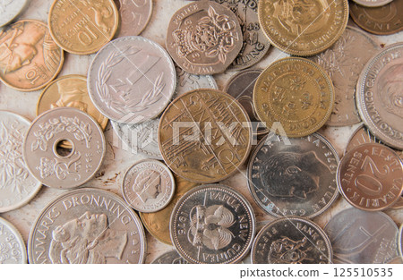 Old golden and silber coins. Old money from Europe. Various coins for business. Financial concept. 125510535