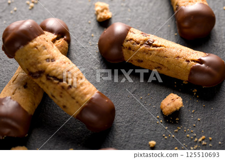 Sticks shortbread dipped in chocolate. Home made cookies Sticks shortbread dipped in chocolate. Home made cookies 125510693