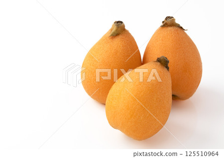 Loquat on a white background Loquat on a white background 125510964