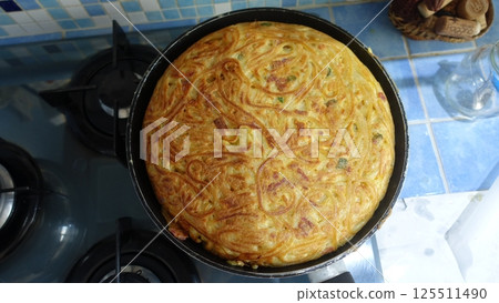 A traditional Neapolitan spaghetti omelette, freshly cooked and ready. 125511490