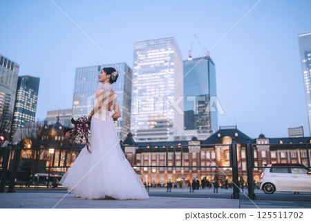 Tokyo Station front photoshoot, female model Tokyo Station front photoshoot, female model 125511702