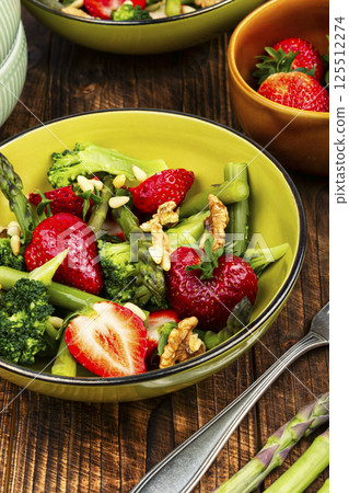 Tasty strawberries, asparagus salad. Tasty strawberries, asparagus salad. 125512274