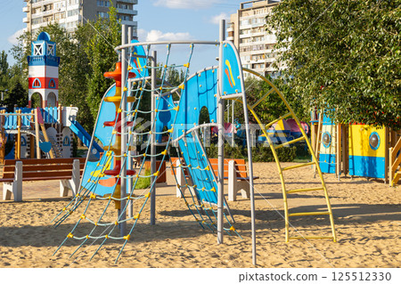 Colorful playground equipment inviting children to play on a sunny day 125512330