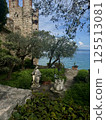 Scenic View of a castle garden overlooking lake Garda, Sirmione, Italy 125513081