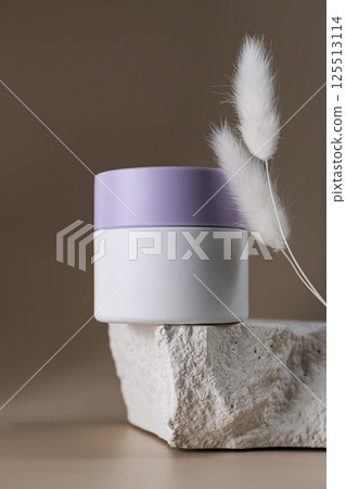 Cosmetic product in modern minimalist still life, empty label, mock up package 125513114
