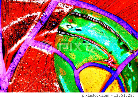 bright streaks of synthetic paint using primary colors, changed colors, red background. 125513285
