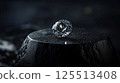 wedding ring on the black stone 125513408