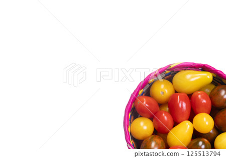 Assorted colorful cherry tomatoes crop on the white background. 125513794