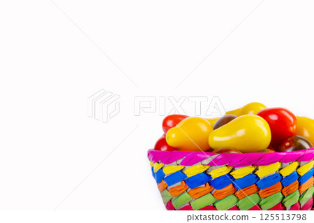 Assorted colorful cherry tomatoes crop on the white background. 125513798