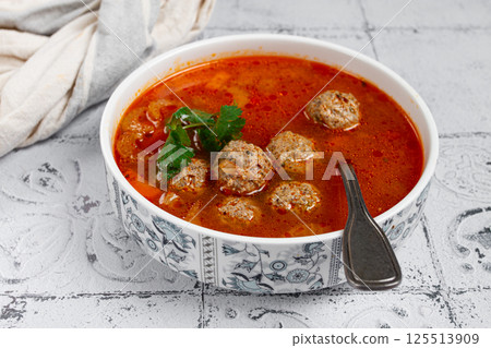 Romanian soup with meatballs, vegetable soup with meatballs, tiled table, homemade, no people, Romanian soup with meatballs, vegetable soup with meatballs, tiled table, homemade, no people, 125513909