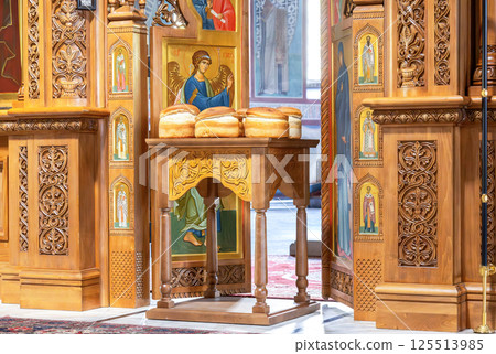 Paschal Artos (Easter bread) in front of opened royal doors. An artos is a loaf of leavened bread 125513985
