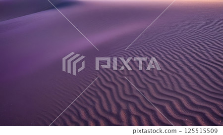 Mesmerizing patterns of sunset-lit desert sand dunes 125515509