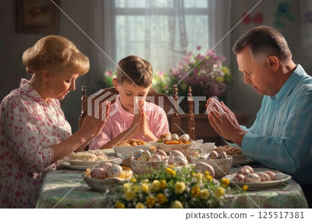Family gathered around a table in prayer before an Easter feast with colorful dishes and decorations. Generative AI 125517381