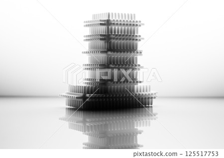 The black and white children's construction set emphasizes the geometry of shapes and textures. The play blocks are laid out on a light background, creating a calm visual effect. The black and white children's construction set emphasizes the geometry of shapes and textures. The play blocks are laid out on a light background, creating a calm visual effect. 125517753