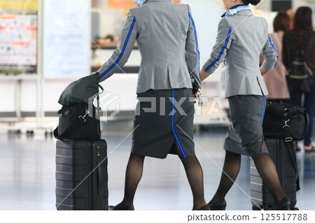 Flight attendant heading to the boarding gate International flight Flight attendant heading to the boarding gate International flight 125517788
