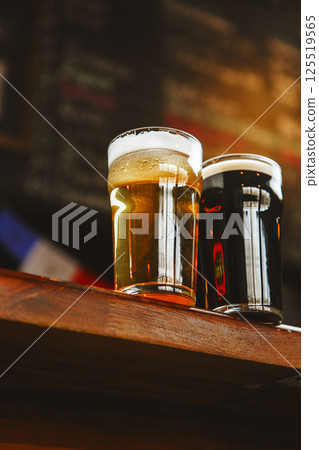 Enjoying Variety of Craft Beers on Bar Counter Enjoying Variety of Craft Beers on Bar Counter 125519565