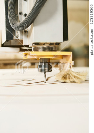 CNC milling machine. Machine tool in wood factory with drilling machines. CNC milling machine. Machine tool in wood factory with drilling machines. 125519566