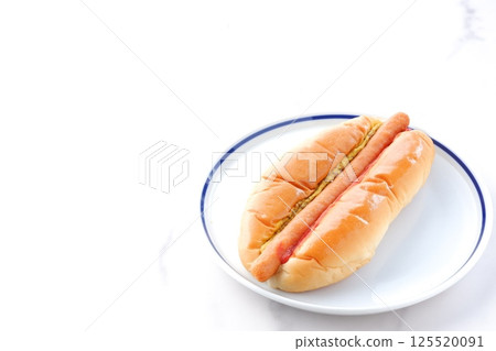 Chorizo sausage bun (hot dog) with mustard and ketchup Chorizo sausage bun (hot dog) with mustard and ketchup 125520091