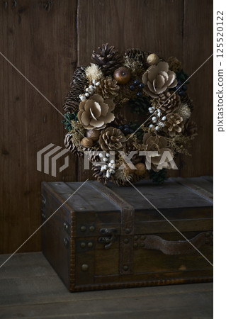 Christmas wreath placed on an old trunk Christmas image Christmas wreath placed on an old trunk Christmas image 125520122