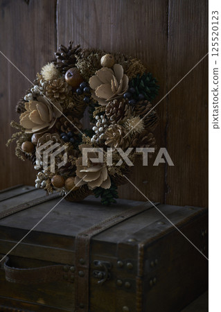 Christmas wreath placed on an old trunk Christmas image Christmas wreath placed on an old trunk Christmas image 125520123