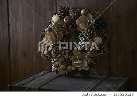 Christmas wreath placed on an old trunk Christmas image 125520126