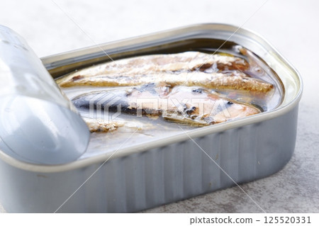 Canned oil sardines made with fresh sardines soaked in olive oil 125520331