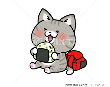 A cat eating rice balls on a field trip 125521092