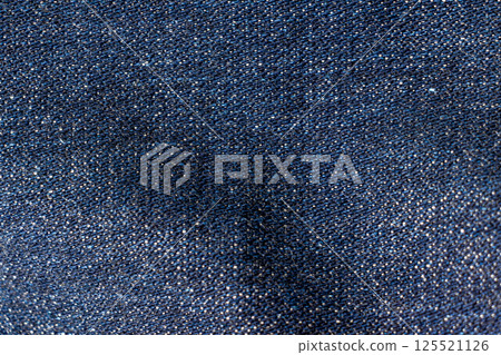 Dark blue denim fabric texture Dark blue denim fabric texture 125521126