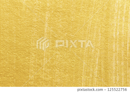 Gold acrylic paint texture on white paper background Gold acrylic paint texture on white paper background 125522756